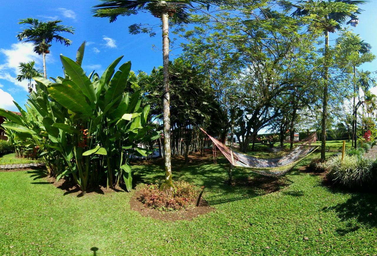 Arenal Backpackers Resort La Fortuna Εξωτερικό φωτογραφία A hammock in the garden of the University of the South Pacific